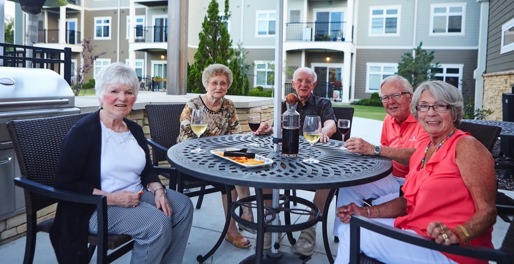 Seniors enjoying lunch outside