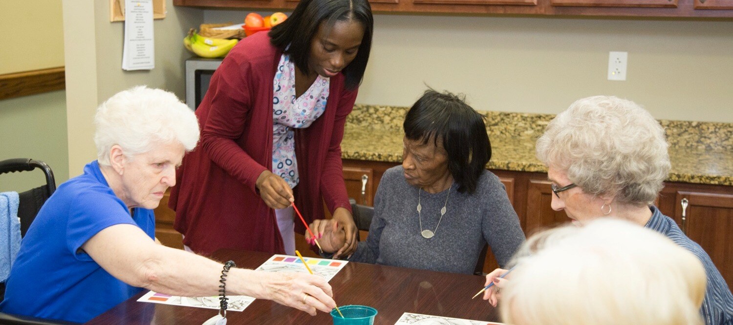 Group of seniors painting together