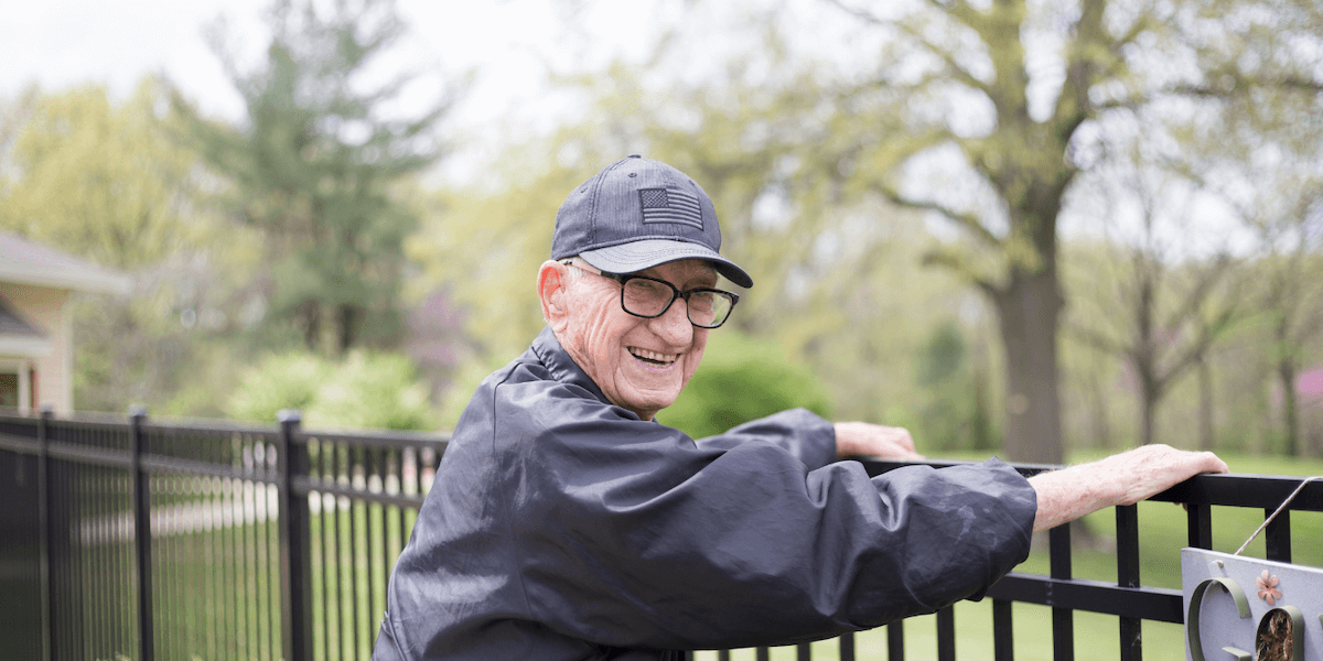 Senior man smiling outdoors