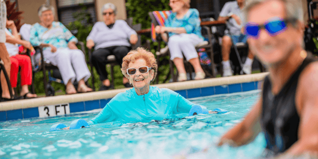 water aerobics class participant at senior living community