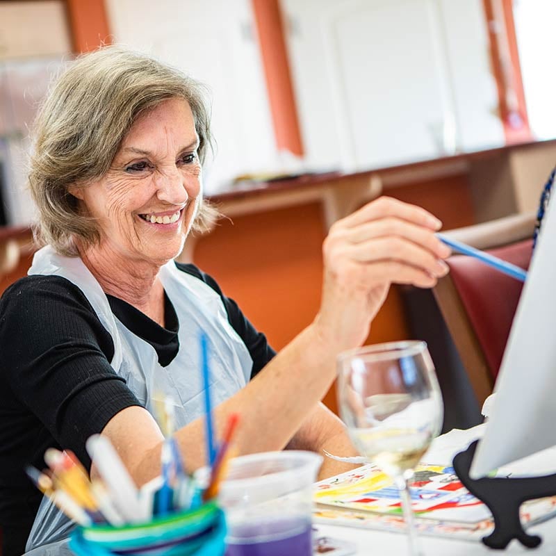 senior woman painting